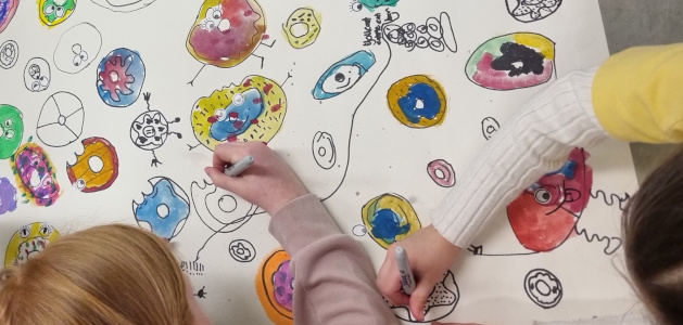 image of students creating art together